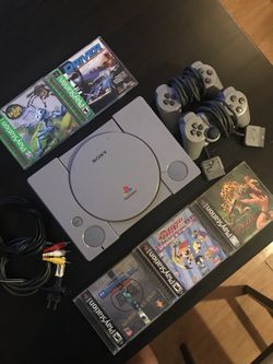Sony PlayStation One with Games & Controllers
