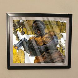 Custom art piece of lil dice from the Brazilian film city of god in black frame