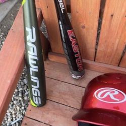Baseball Bats And Helmet