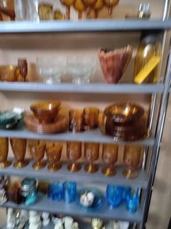 All kinds of depression glass and ball jars