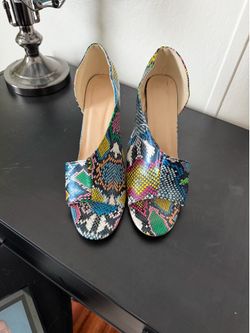 Women’s colorful, snake skin design heels
