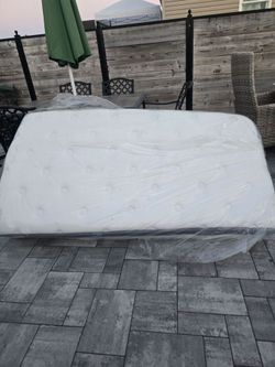 Free twin mattress was in the basement water got lil water inside