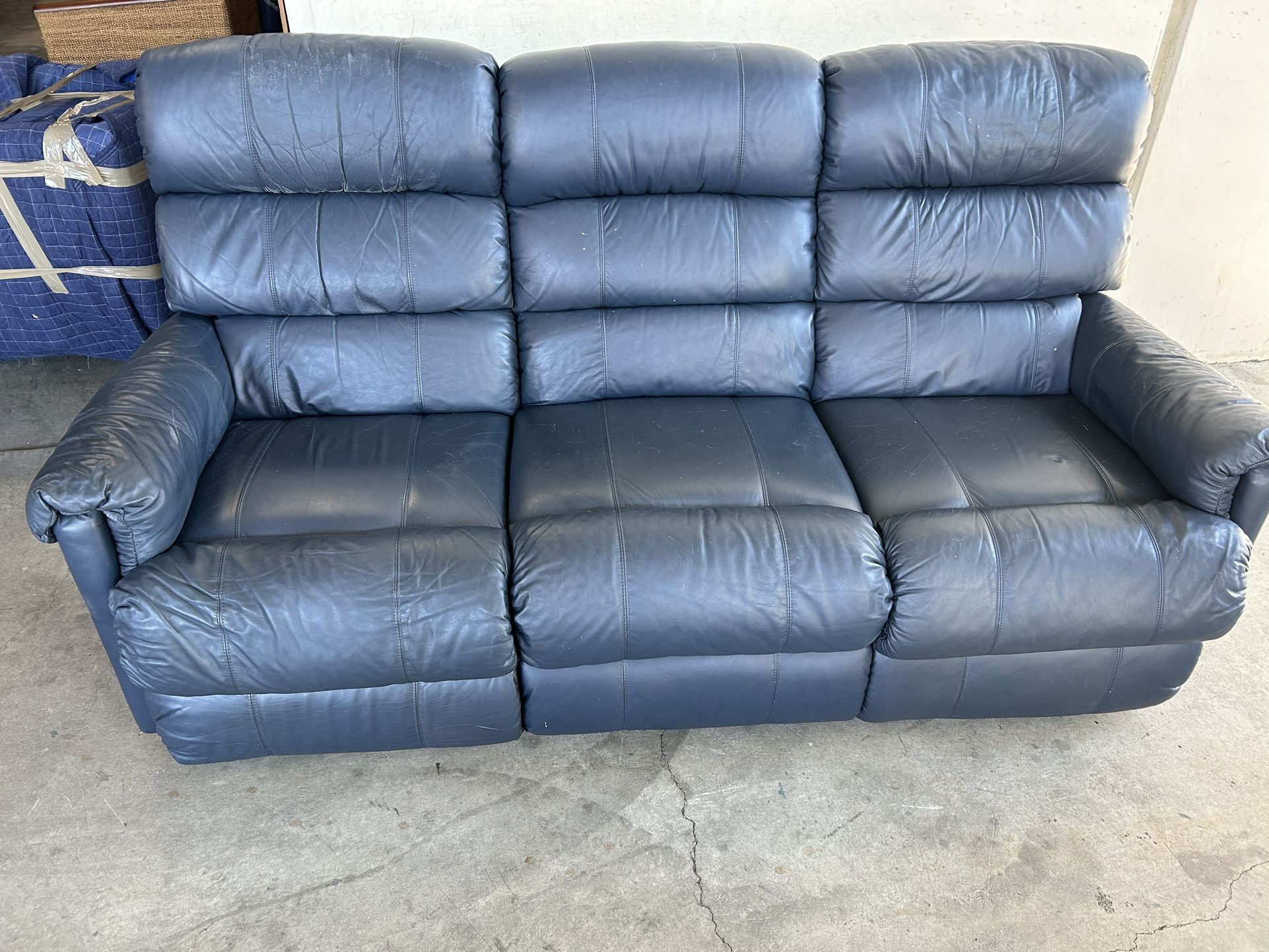 La-Z-Boy Navy blue leather couch and rocking loveseat