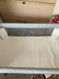 Used bedside bassinet