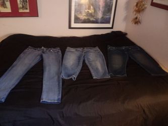 2 pair of women's. capris & jeans size 13-14