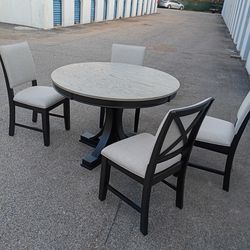 Comedor redondo de 4 sillas