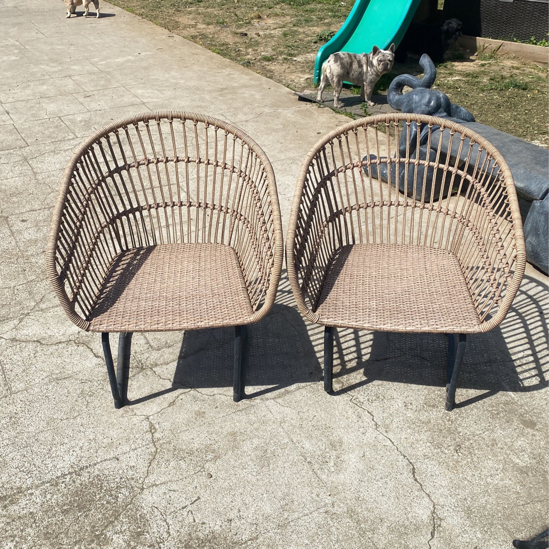 Antique Wicker Chairs Made Out Of Metal On The Bottom