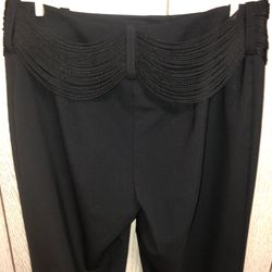 INC stretch international concepts black slacks/dress pants with lots of strings that go all the way around the waist and sort of look like a belt gi