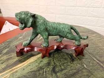 verdigris patinated bronze roaring tiger