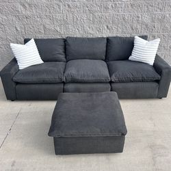 Ashley Furniture “Savesto” Charcoal Gray Cloud Couch