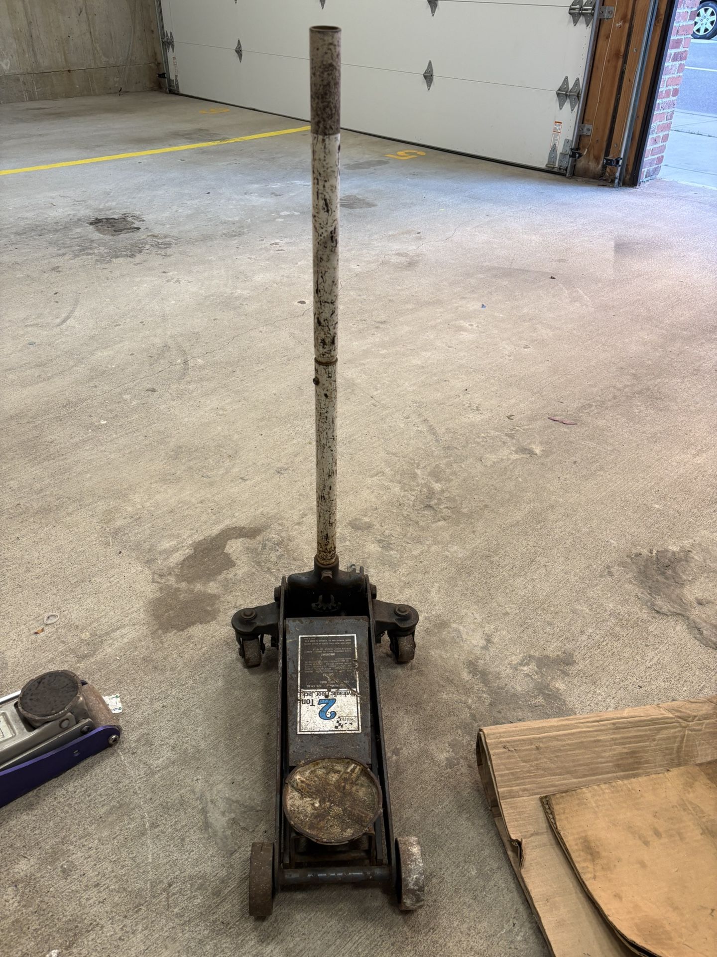 Sears 2-ton hydraulic floor jack.