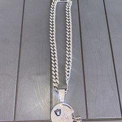 Brand New Blinging  Raiders Helmet pendant and Chain $60