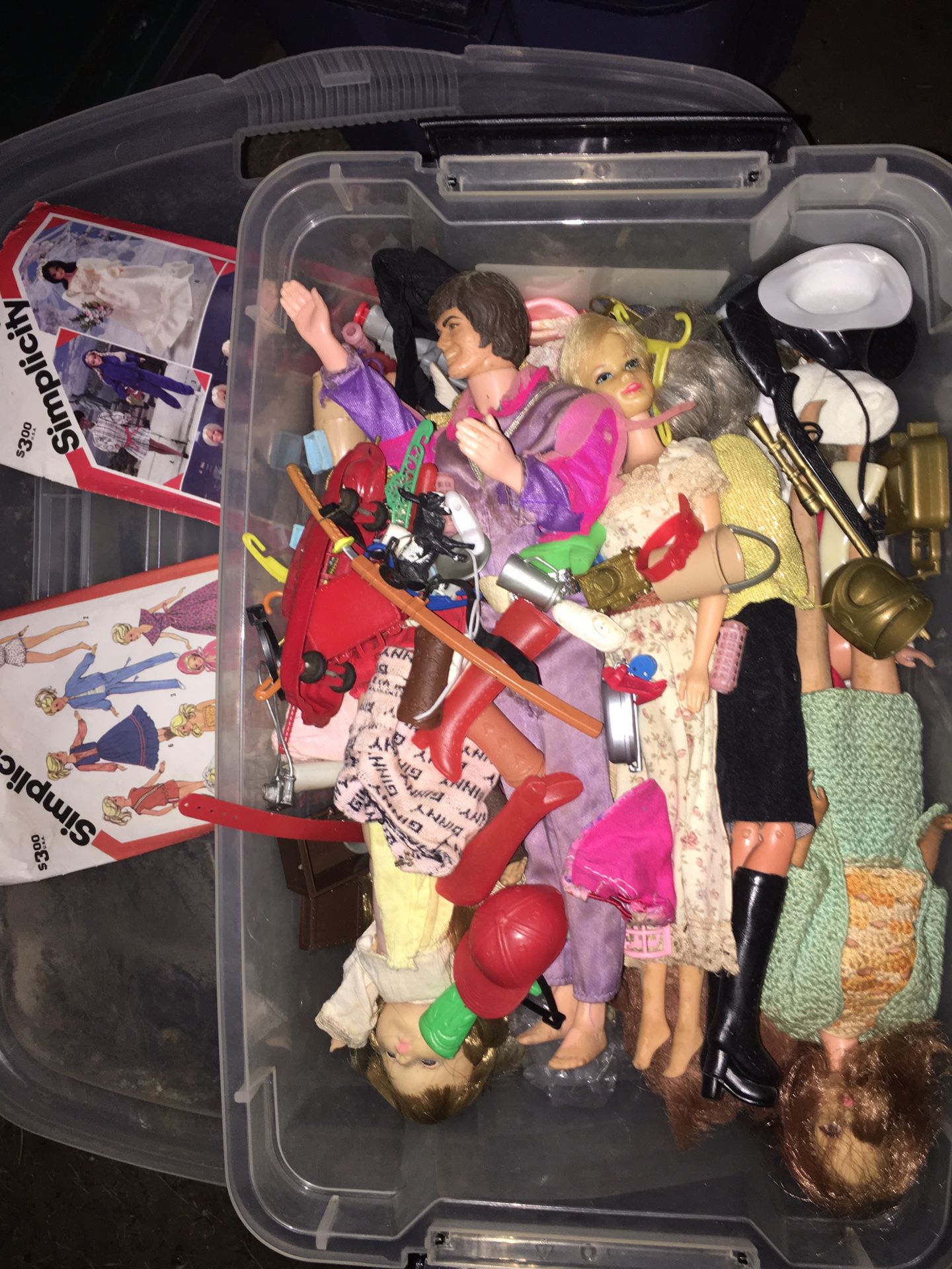 Vintage Barbie dolls and ken dolls with clothes and patterns everything goes for $60 firm