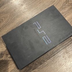 black Sony PlayStation 2 (PS2) console.