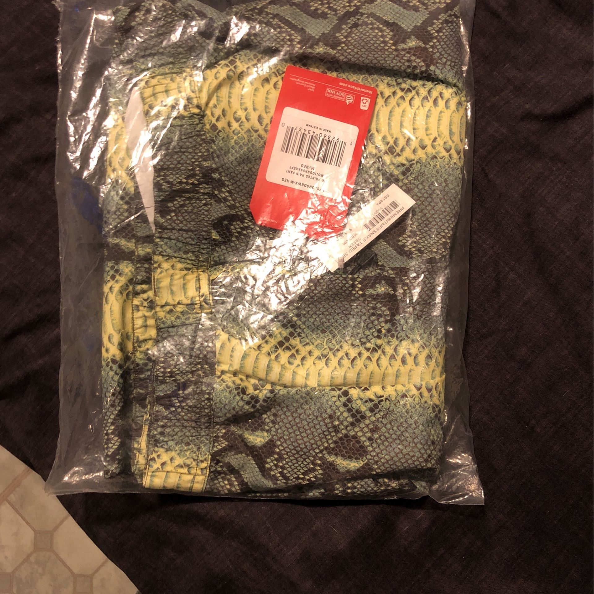 supreme x north face snake skin pants 