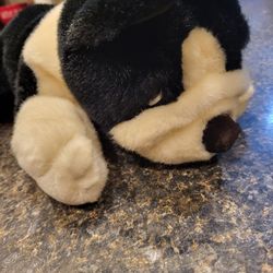 Frazier black/white plush dog