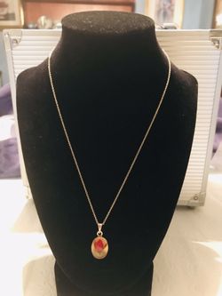 Vintage.925 Silver charm Mexico. That is a rose bud inside