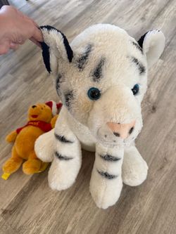 Large stuffed animal plus Pooh Xmas bag