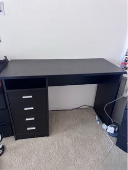 Wooden desk with chair and shelf