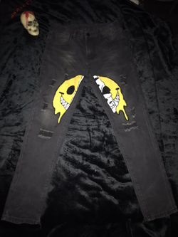 Skinny Jeans With Large Drippy Skeleton Patch