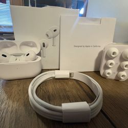 PRICE IS NEGOTIABLE AIRPODS PRO 2ND GENERATION W/CHARGING CASE 