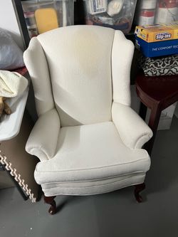 Beautiful cream embroidered accents chair