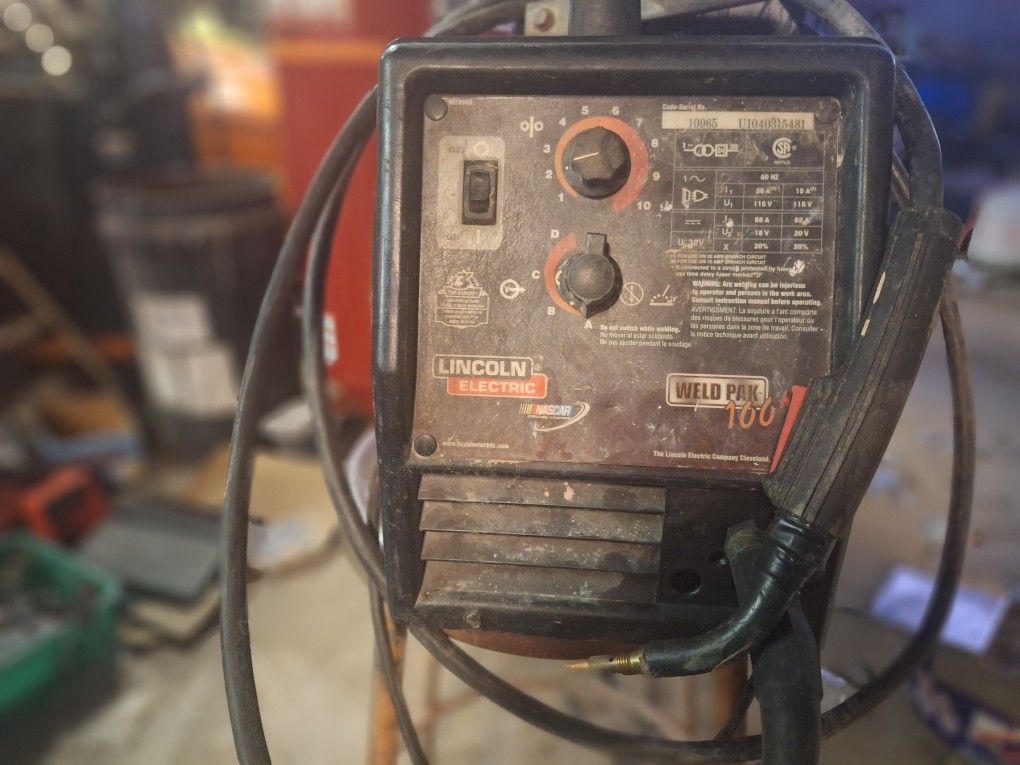 Lincoln Weld Pac-100 mig welder with a welder cart.