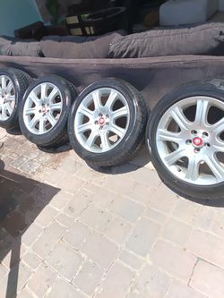 4 18in rims and tires. Tires still in good condition