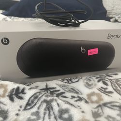 Beats Pill And AirPods Pro 
