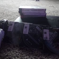 Ps3 with 2 controllers & games 