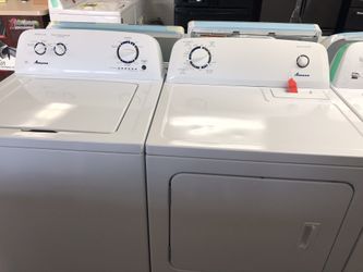 Used Amana High Efficiency washer and dryer set. 1 year warranty