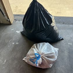 BAG OF WOMEN CLOTHES WITH FREE HANDBAGS
