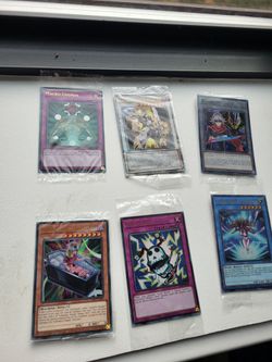 Sealed Yu-gi-oh Promos, Field Centers, and Lost art cards + 1 sealed McDonald's Pokémon pack