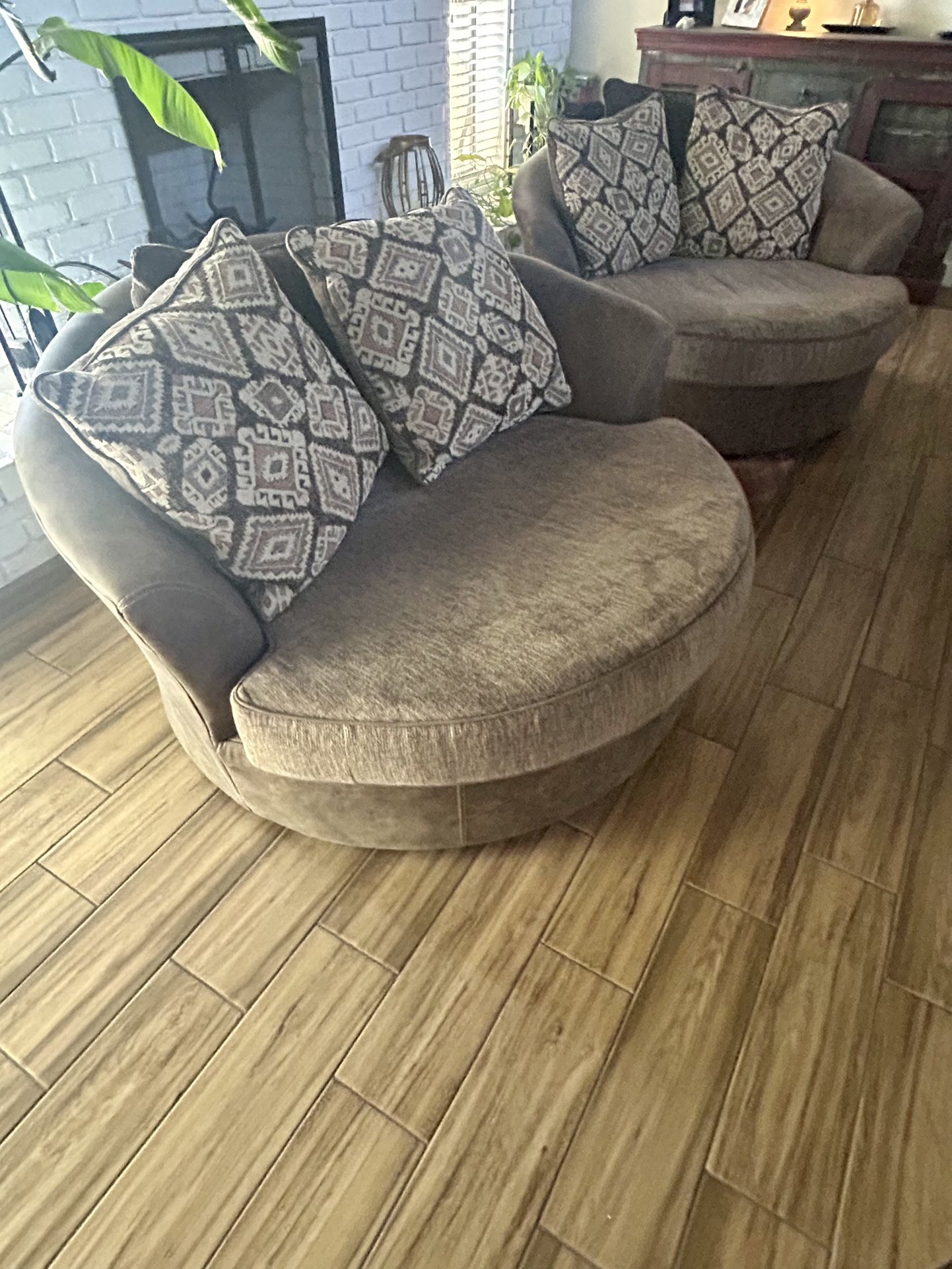 Pair Of Oversized Swivel Chairs 