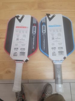 Two brand new pickle ball paddles. Persious 5 and Hyperion 5
