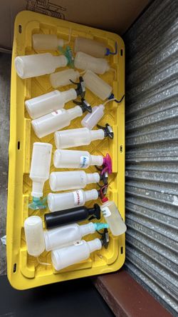 Assorted Spray Bottles Tattoo Barber