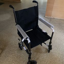 Medline Durable Folding Steel Transport Wheelchair with Swing-Away Footrests, 19-Inch Seat Width, Black Frame, Black Upholstery