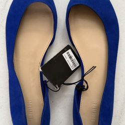 Vibrant blue suede flats.