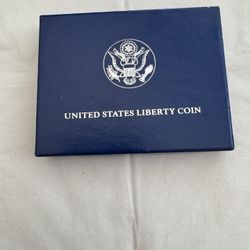 LIBERTY  HALF DOLLAR  COIN WITH  CASE, MINT CONDITION.