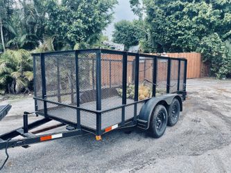 PAID $4100 2019 Practivally New 7x12 Dual Axel Trailer. Custom order solid steel floor / Large let down gate / Electric brakes