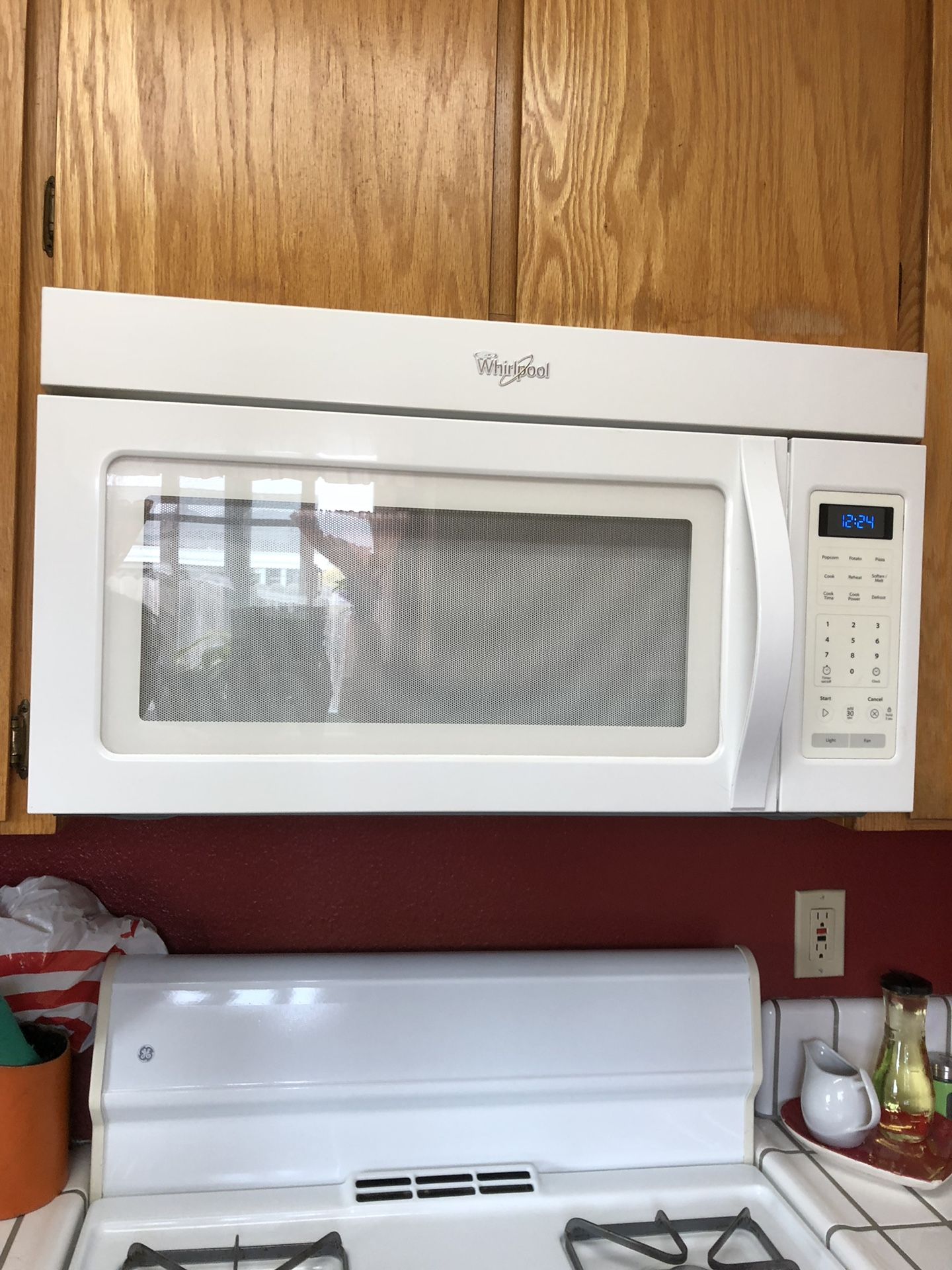 Whirlpool hood Microwave like new condition