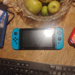 Nintendo Switch, 2 Keyboards   A Controller And 3 Ps5 Game's 