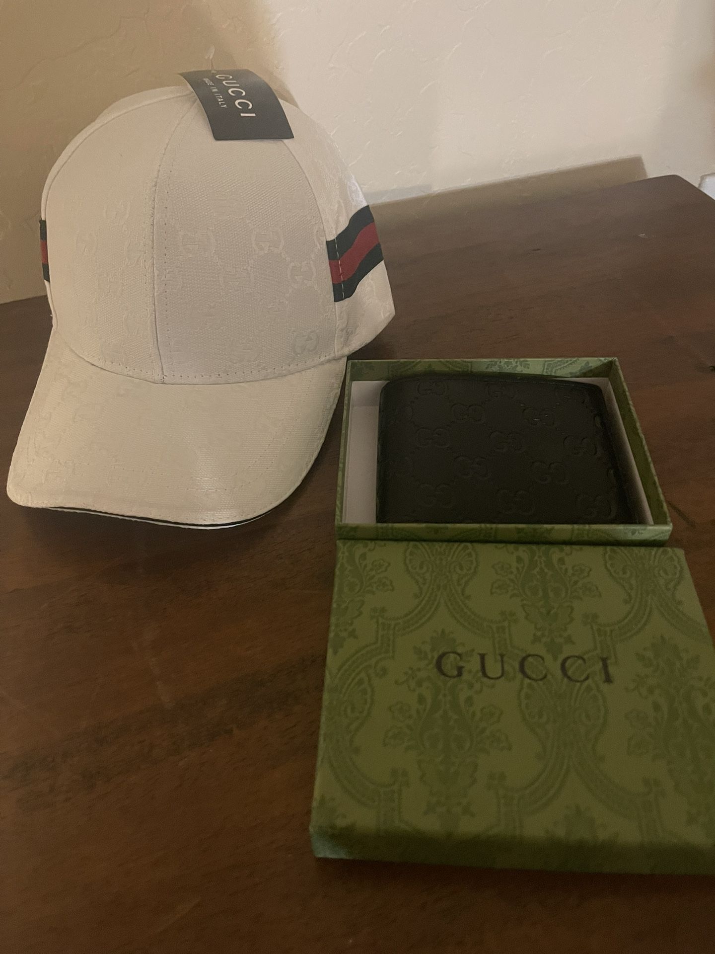 White Gucci Hat & Black Gucci Leather Wallet