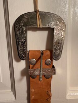 Cowboy belt with silver buckle