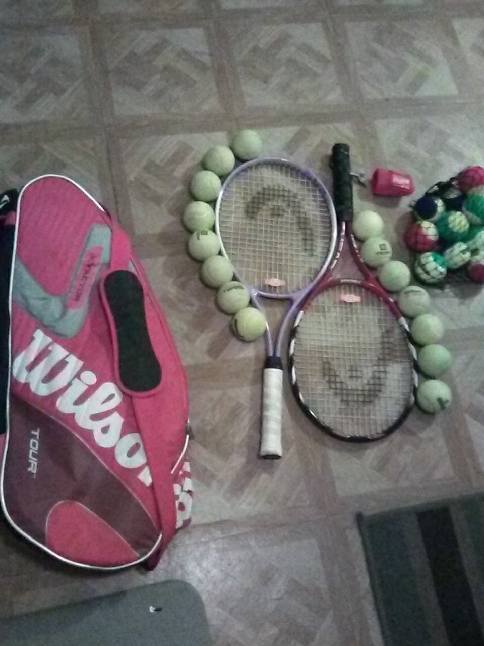 Man and woman's tennis rackets Head elite lite and tour pro. And Wilson (K) factor bag