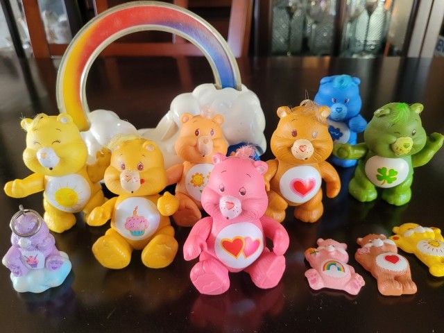 7 Poseable Care Bears Plus 3 Magnets And 1 Keychain, With Cloud Rainbow Car