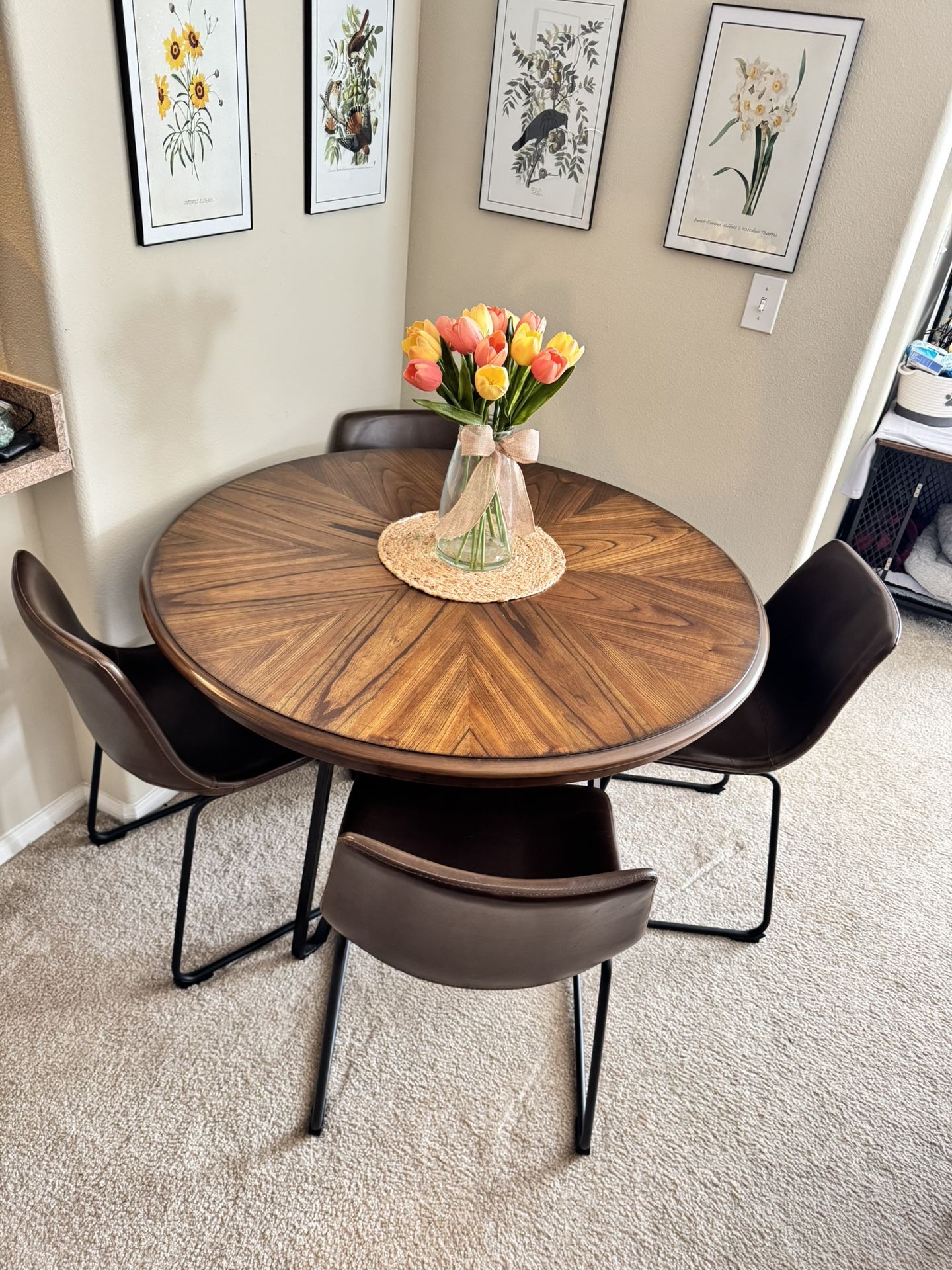 Ashley’s Centiar Round Dining Table with Hairpin Legs and matching Bucket seats