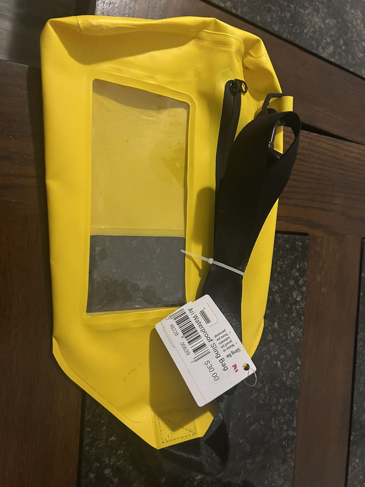 WATERPROOF SLING BAG. A MUST HAVE FOR KAYAKING WITH YOUR CAMERAS AND PHONES WALLET ANYTHING YOU WANT TO KEEP DRY