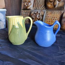 PAIR OF VINTAGE CREAMERS