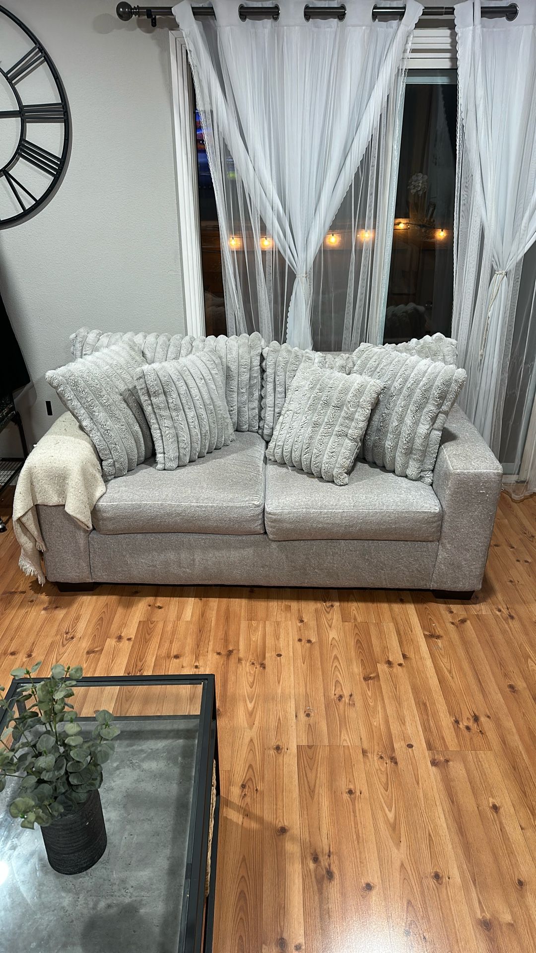 Soft grey faux fur modern Sofa . Plush and less than 1 & Half Used